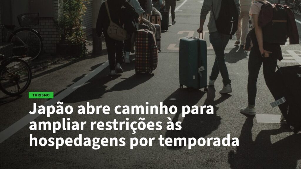 People with rolling suitcases walk along a sunlit city street, signaling travel and tourism. (news hero image)
