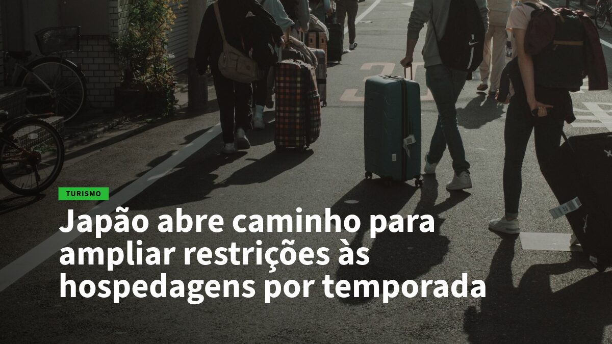 People with rolling suitcases walk along a sunlit city street, signaling travel and tourism. (news hero image)