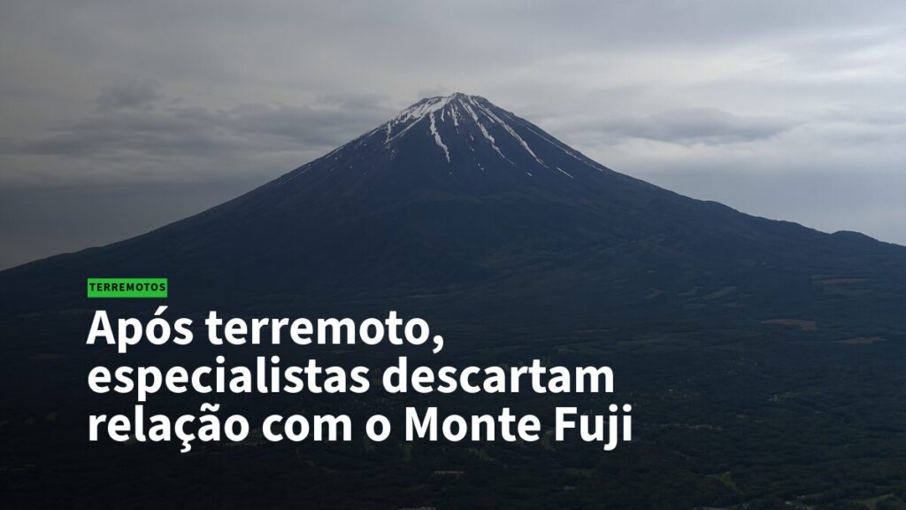 News banner over Mount Fuji with Portuguese headline: 'Após terremoto, especialistas descartam relação com o Monte Fuji' and a green 'TERREMOTOS' label.