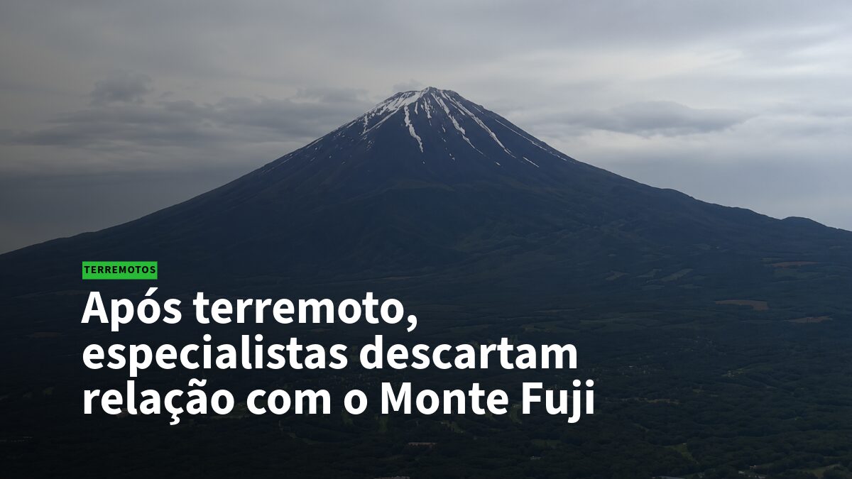 News banner over Mount Fuji with Portuguese headline: 'Após terremoto, especialistas descartam relação com o Monte Fuji' and a green 'TERREMOTOS' label.